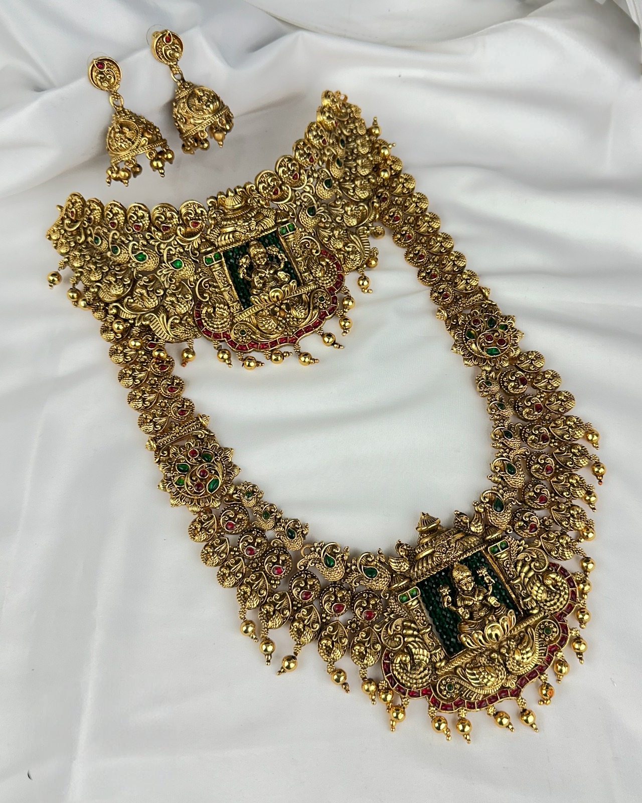 Luxurious Antique Gold-Plated Semi Bridal Temple Jewellery Set with Lakshmi Motif Haaram Luxurious Antique Gold-Plated Semi Bridal Temple Jewellery Set with Lakshmi Motif Haaram